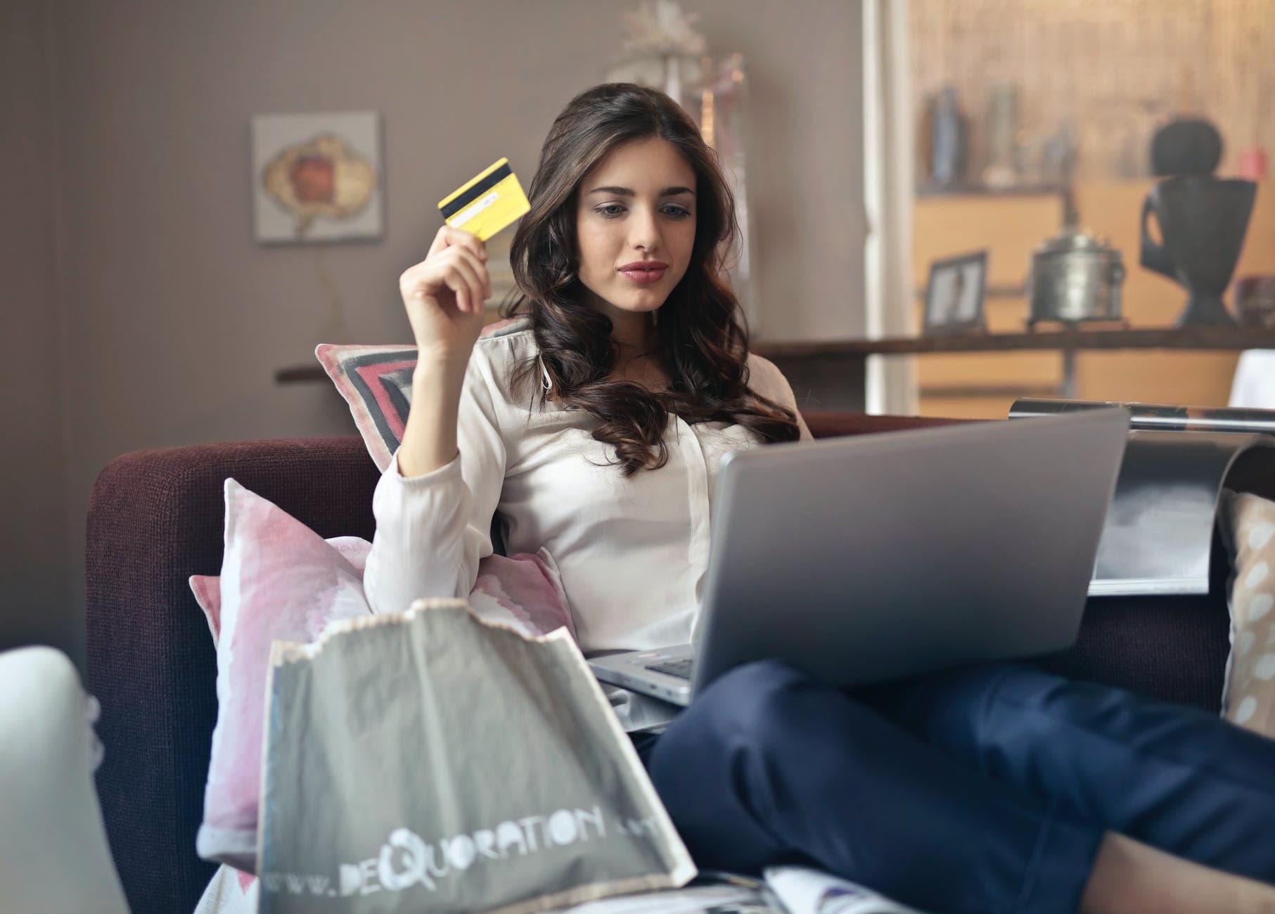 Explain merits and Demerits of E-commerce?